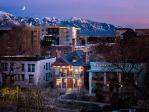 Hero image for a luxury vacation rental—showcasing architectural charm, mountain views, and atmospheric lighting