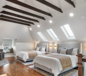 Soft textures and layered bedding in guest suite